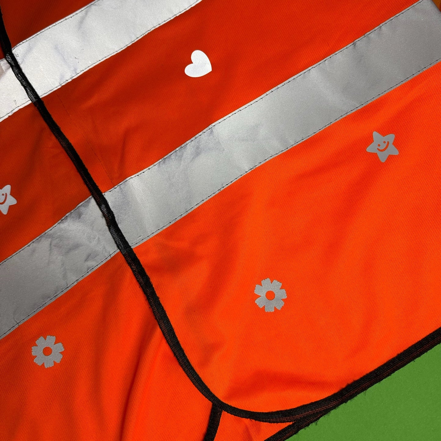 High vis vest with reflective stickers