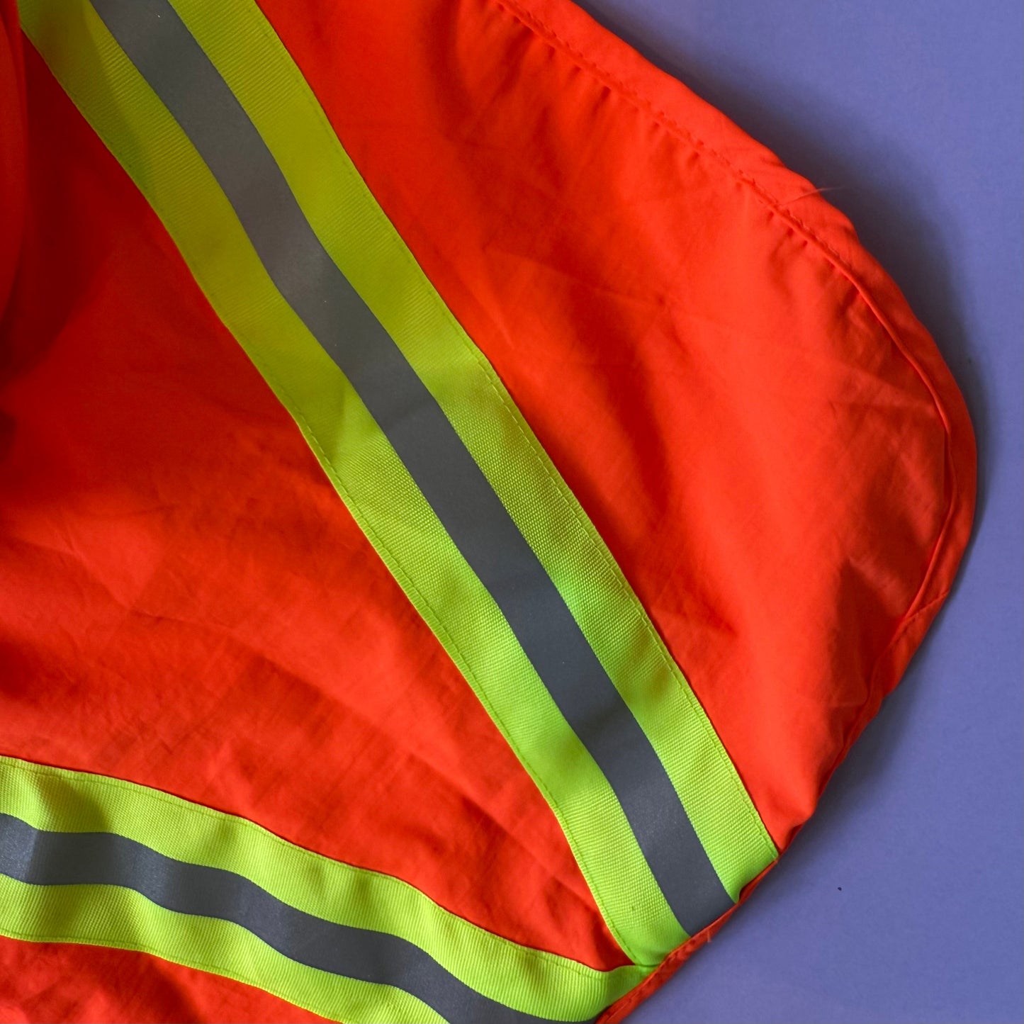 Neon orange reflective rain and sun hat