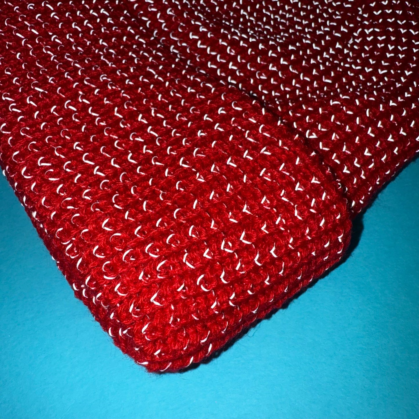 Red beanie with reflective yarn