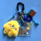 Bag charm yellow alien