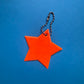 Neon star light reflective charm