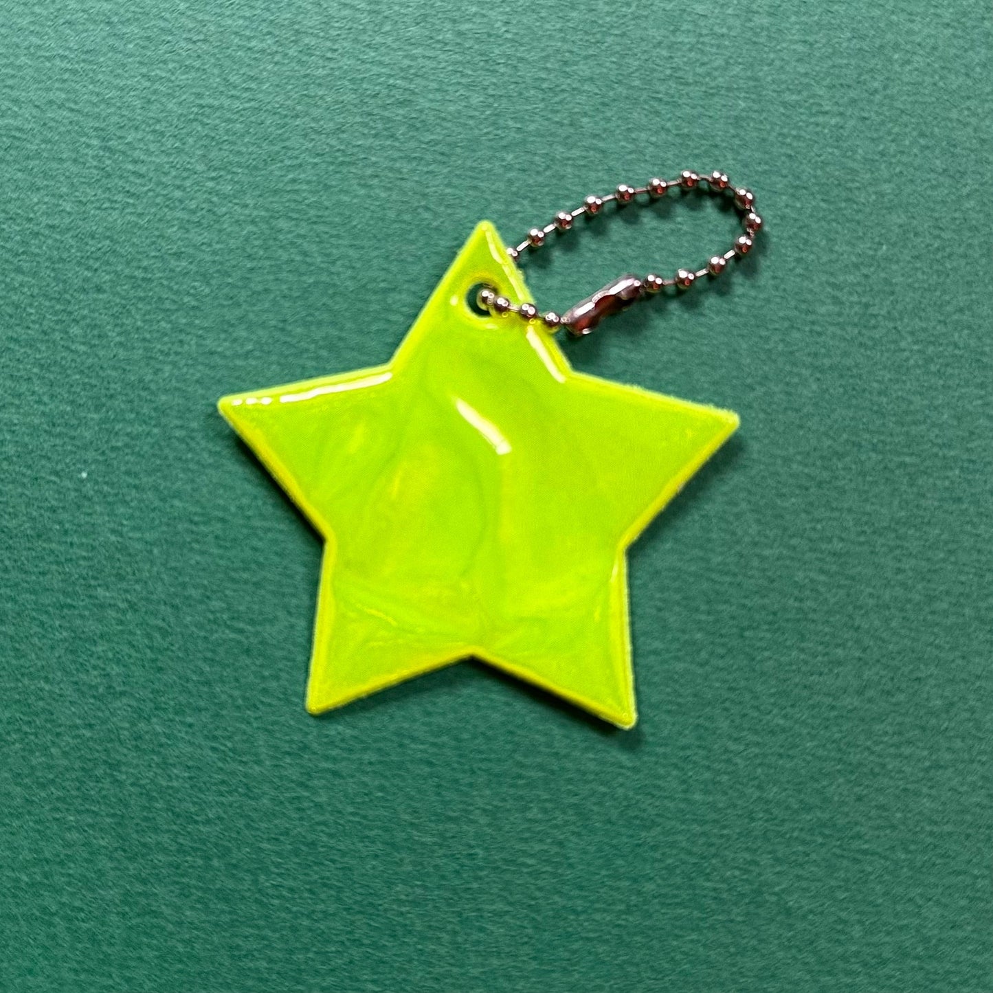 Neon star light reflective charm