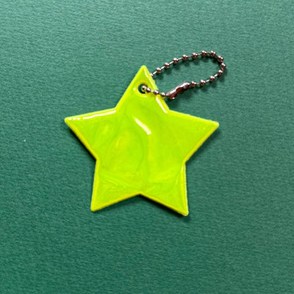 Neon star light reflective charm