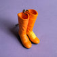 Neon 80s plastic orange boots charm