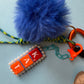 Bag charm blue fluffy