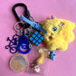 Bag charm yellow alien