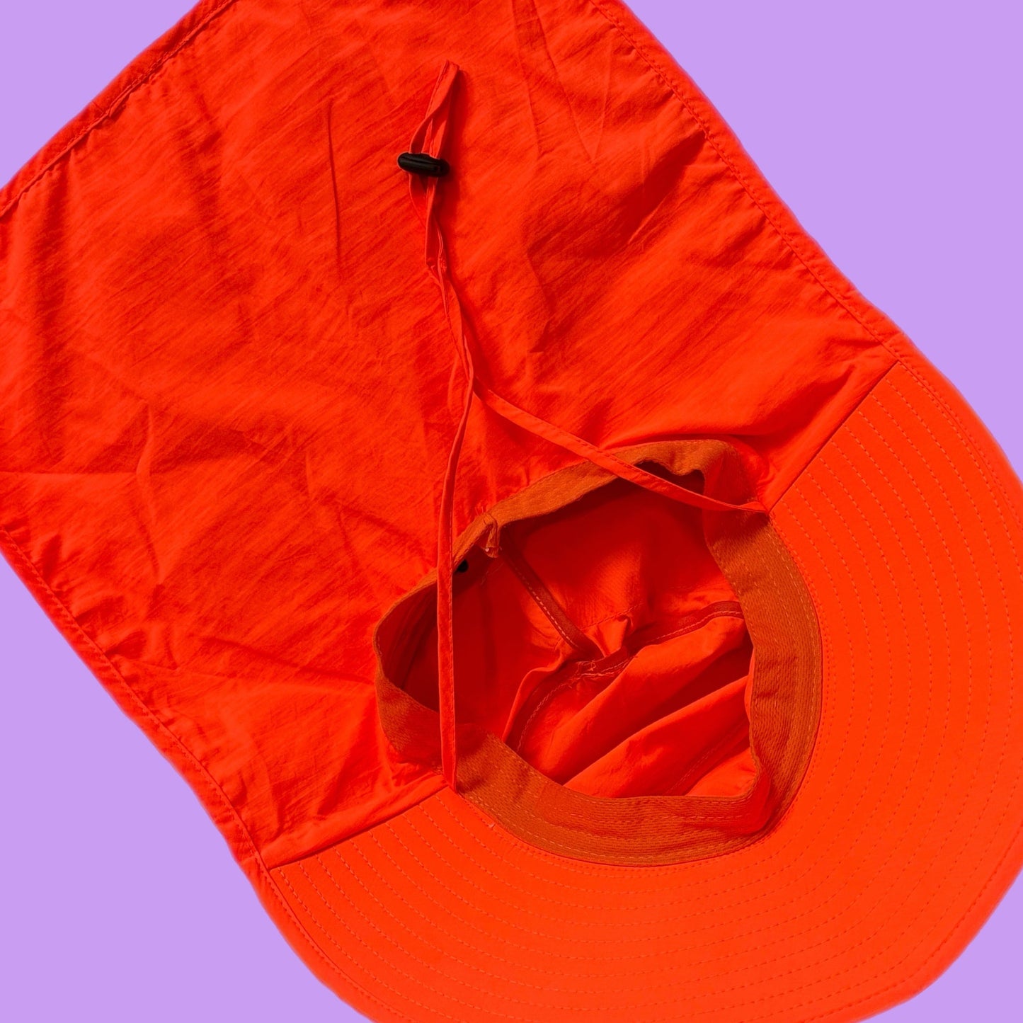 Neon orange reflective rain and sun hat