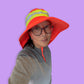 Neon orange reflective rain and sun hat
